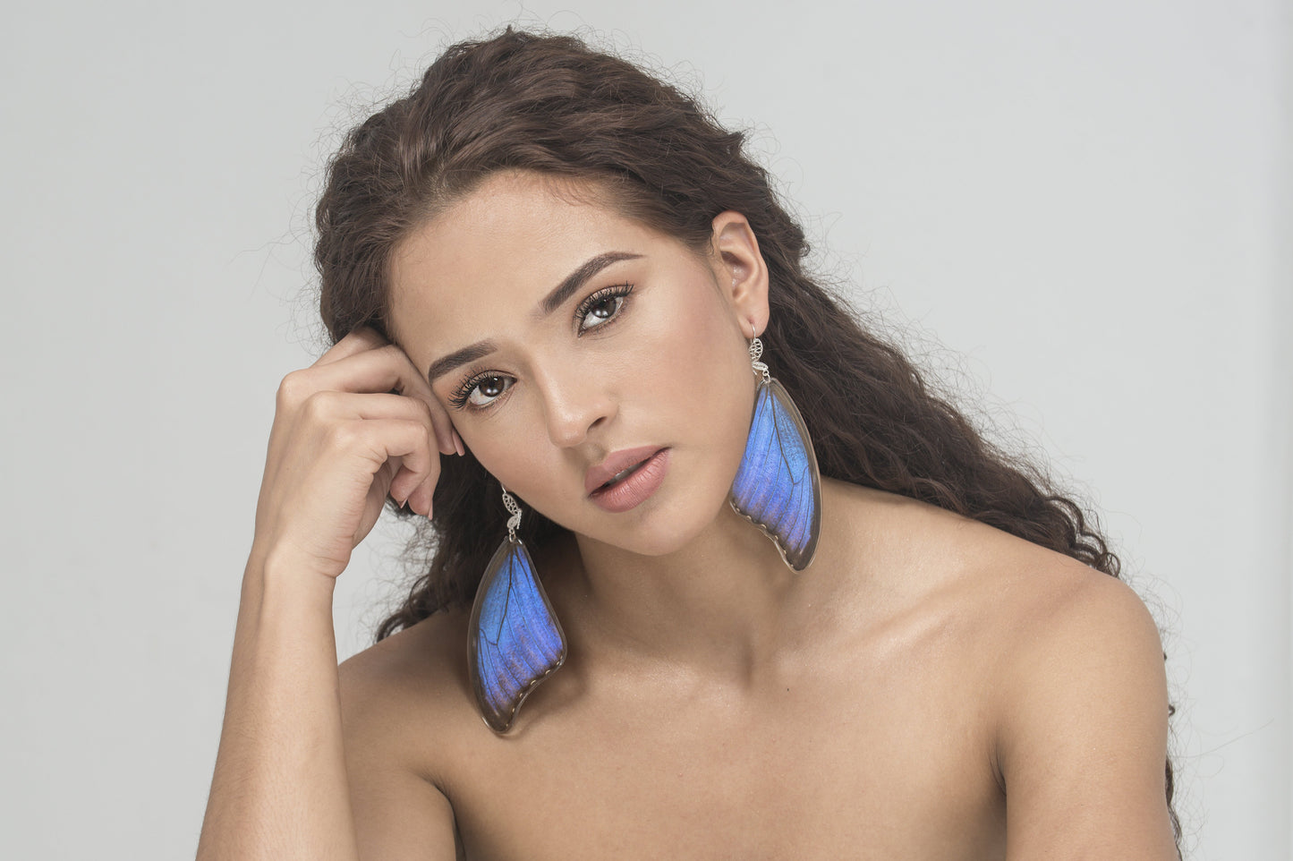 Long blue statement earrings made with real butterfly wings. Sterling silver filigree hooks.