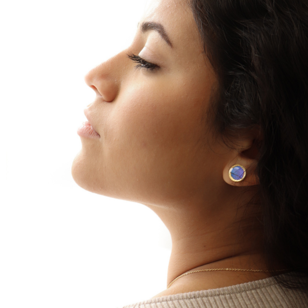 Round blue stud earrings with golden edge