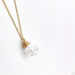 Dandelion seeds in a blown glass sphere. Dainty 16 K gold-plated chain.